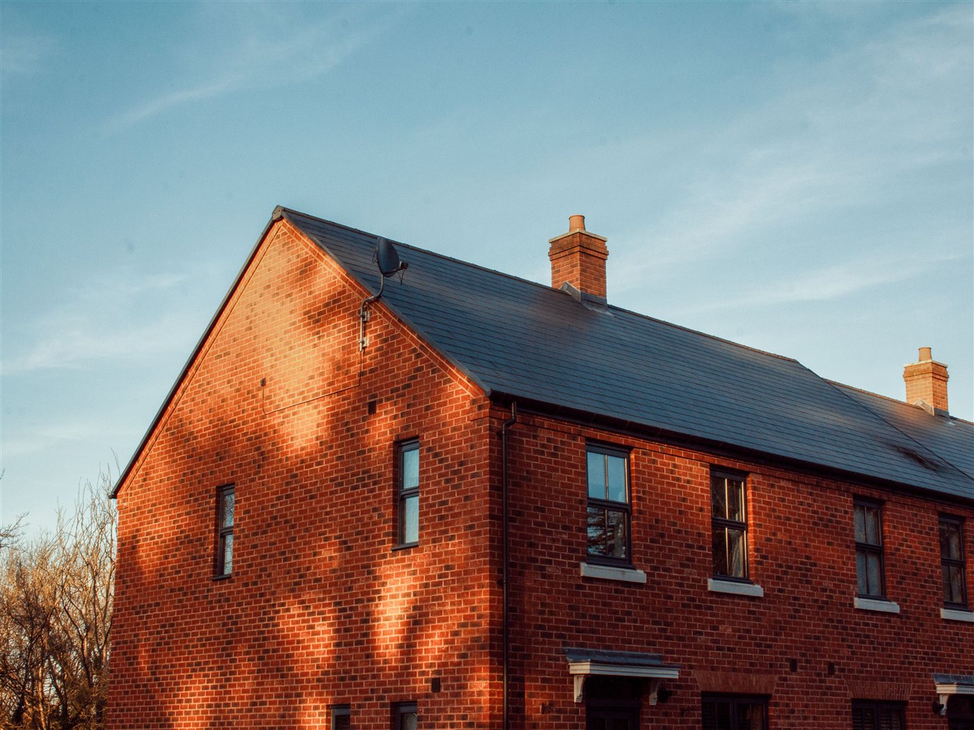 Gifted deposit bridging loan — property purchase documents and keys on a solicitor's desk